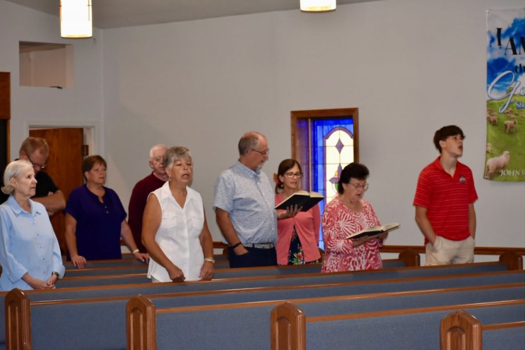 People singing in congregation